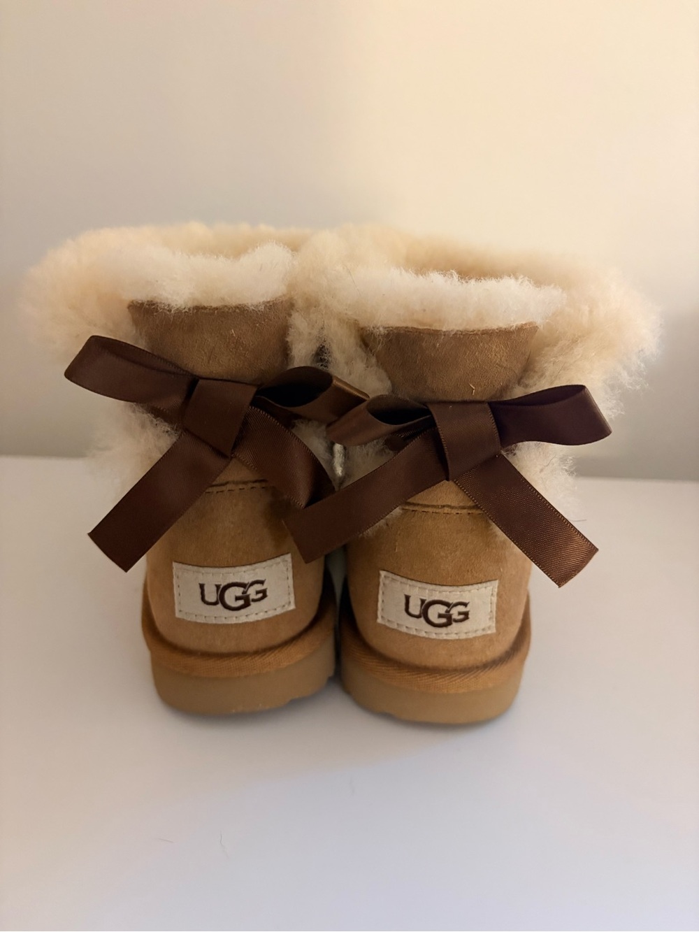 UGG Kids Mini Bailey Bow II Suede Bow-Back Boots in Chestnut
